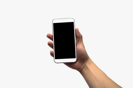 hand holding the black and white smartphone.の写真素材