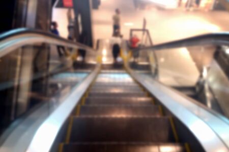 blurred photo, Blurry image, Escalator in department store, backgroundの写真素材