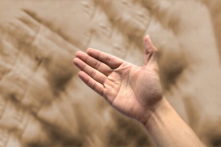 hand is reaching out so it can shake hands.の写真素材