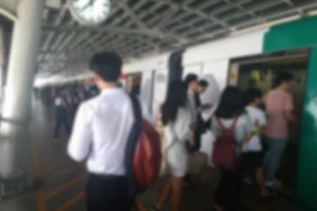 blurred photo, Blurry image, people At station Electric train, backgroundの写真素材