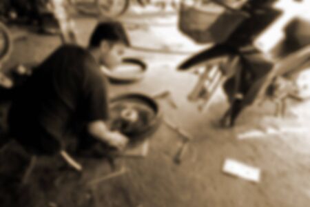 blurred photo, Blurry image, Motorcycle Repair Shop, backgroundの写真素材