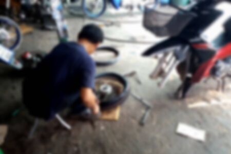 blurred photo, Blurry image, Motorcycle Repair Shop, backgroundの写真素材