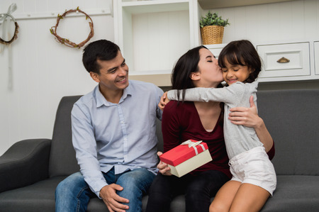 Families are happy to be together at home.の写真素材