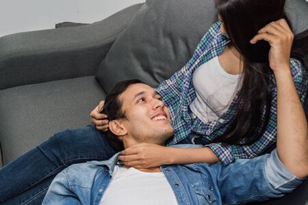 Male and female are kissing in the bedroom.の写真素材