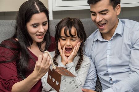 Families are happy to be together at home.の写真素材