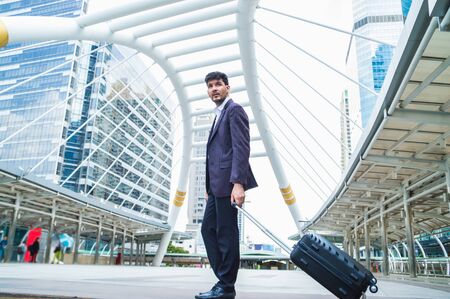 Young businessmen look good on the outside background.の写真素材