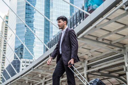Young businessmen look good on the outside background.の写真素材
