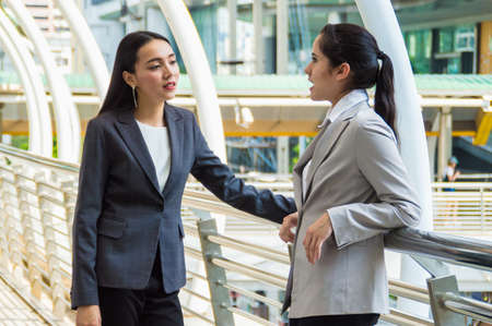 Young businessmen meeting outside the business district.の写真素材