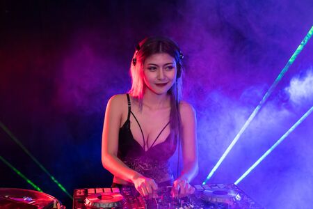 Young people are celebrating the night party entertainment.の写真素材