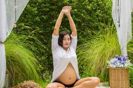 Abdominal women are taking care of their health with yoga.