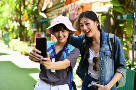 Beautiful girls are traveling abroad with fun.の写真素材