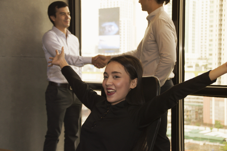 Businessmen are working diligently in the office.の写真素材