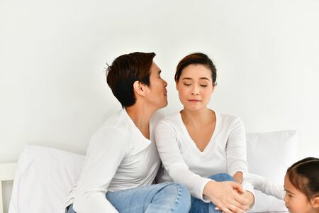 Parents and children are expressing emotions in the home.