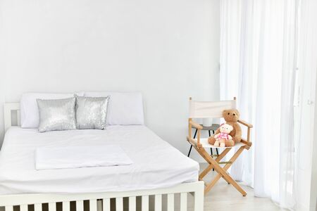 The white bedroom interior on Elegant decorationの写真素材