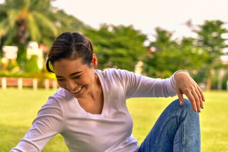 A good young woman doing activities in the park.の写真素材