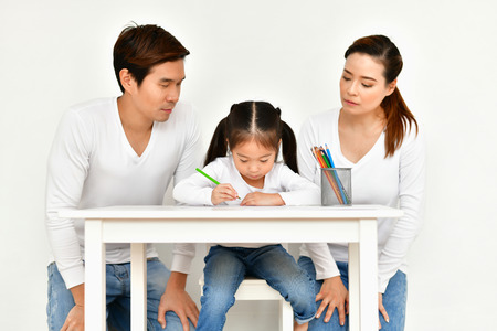 Familys are drawing activities in the home.の写真素材