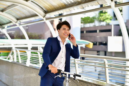 Concept Business people playing sports, Businessmen like to bike.の写真素材