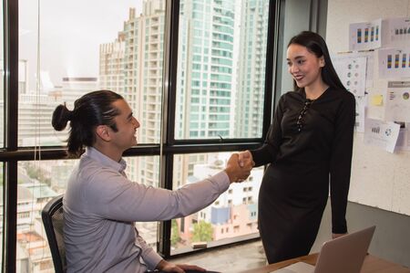 Business Concepts. Businessman is working in office. Business People work happily and relax. The businessmen are serious. Businessmen, they talk and communicate.の写真素材