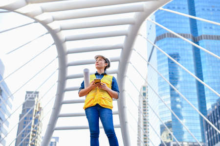 Business  Engineering Concepts, Professional engineers, Young Business people are playing mobile...