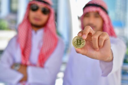 Arab Business Concepts, Arab business people  succeed in and earn from bitcoin.の写真素材