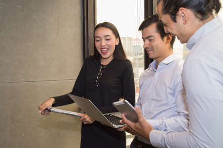 Business Concepts. Businessman is working in office. Business People work happily and relax. The businessmen are serious. Businessmen, they talk and communicate.の写真素材