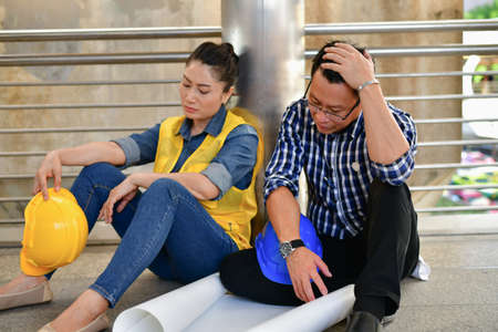 Concepts Business Engineering Stress, The engineer worked unhappily, Young Business people are tense with the job.の写真素材