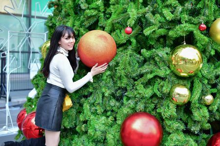 Christmas and New Year Concept, Beautiful girls are happy to celebrate Christmas and New Year. Asian women are very happy on New Year's Eve.の写真素材