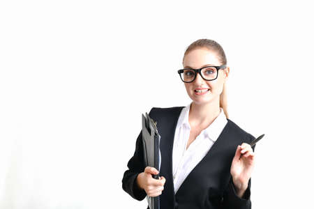 Business Concept. Beautiful young businesswoman looks charming and trustworthy. Young businesswoman has leadership on a white background. Young businesswoman is working happily.の写真素材