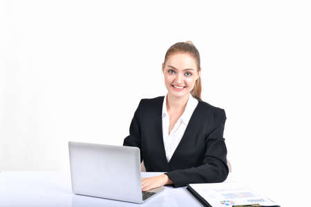 Business Concept. Beautiful young businesswoman looks charming and trustworthy. Young businesswoman has leadership on a white background. Young businesswoman is working happily.の写真素材