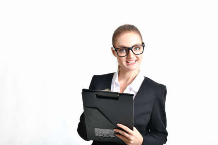Business Concept. Beautiful young businesswoman looks charming and trustworthy. Young businesswoman has leadership on a white background. Young businesswoman is working happily.の写真素材
