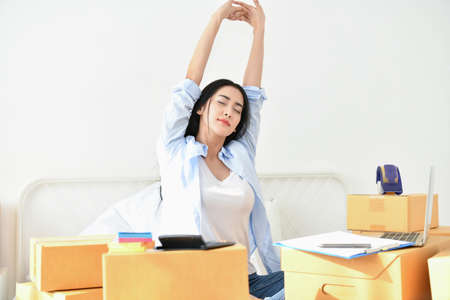 Sme business concept. Young woman is working in the house.Young Owner Start up for Business Online....