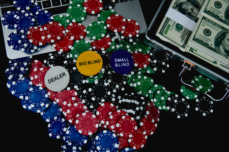 Gambling Concepts. Businessmen are gambling in the casino. Betting is a gamble for investors. Businessmen are playing card games on a black background.の写真素材