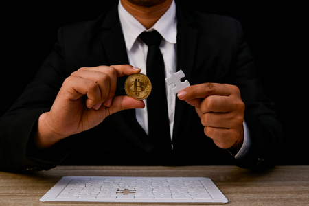 Finance Business Concepts. Lots of money on a black background. Investments are a necessity of business. Businessman looking at a lot of money.の写真素材