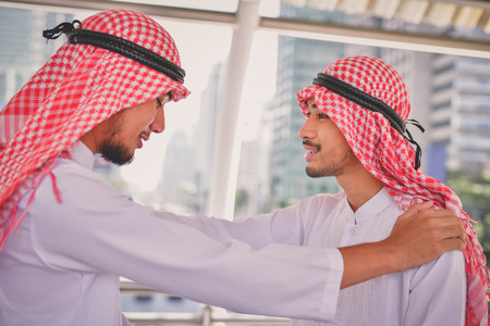 Arab Business Concepts, Arab business people are working in the business district. Businessmen are meeting outside. Business people are working happily.の写真素材