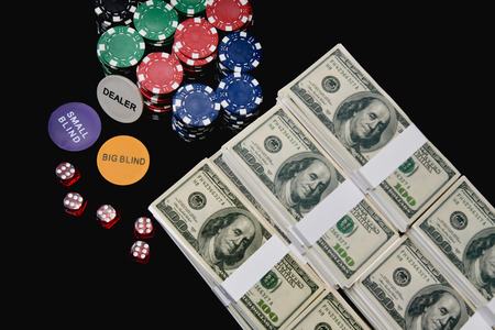 Gambling Concepts. Businessmen are gambling in the casino. Betting is a gamble for investors. Businessmen are playing card games on a black background.の写真素材