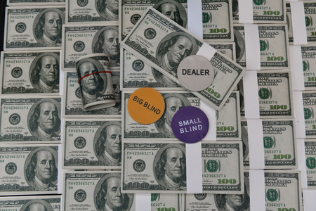 Gambling Concepts. Businessmen are gambling in the casino. Betting is a gamble for investors. Businessmen are playing card games on a black background.の写真素材