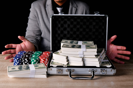 Gambling Concepts. Business people are gambling in the casino. Betting is a gamble for investors.の写真素材