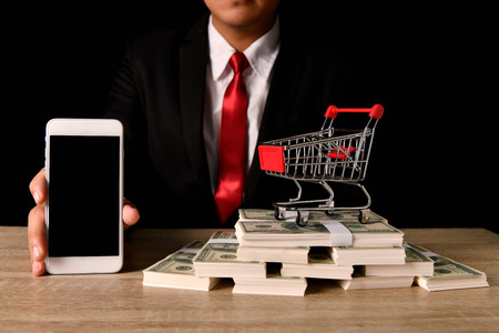 Finance Business Concepts. Lots of money on a black background.
Online business trading on a black background.の写真素材