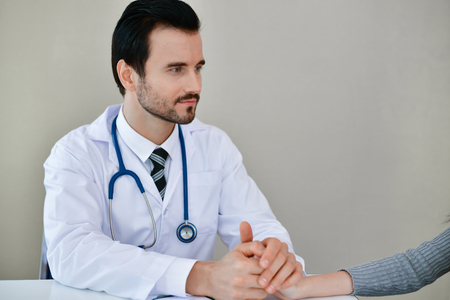 Health Concepts. The doctor is examining the patient's health. Patients are happy to come to the doctor. Medical examination results and Medical Consultation for Patients. The patient relaxes.の写真素材