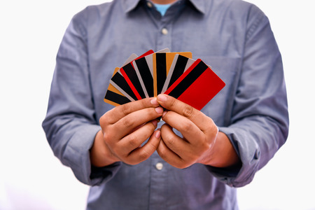 Finance Business Concepts. Businessmen are using a credit card on a black background.の写真素材