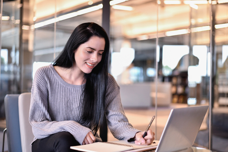Business Concept. Beautiful businessmen are working in the office. Beautiful businesswomen dressed in casual wear to work on holidays.の写真素材