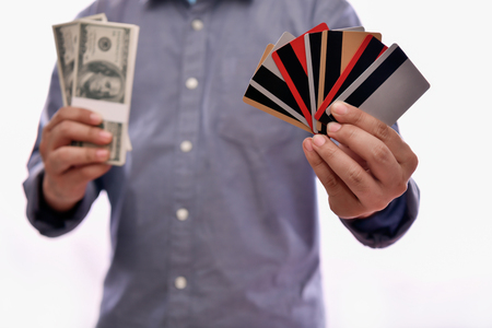 Finance Business Concepts. Businessmen are using a credit card on a black background.の写真素材