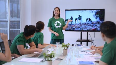 Conservation concept. Employees of the company are presenting the benefits for the publicの写真素材