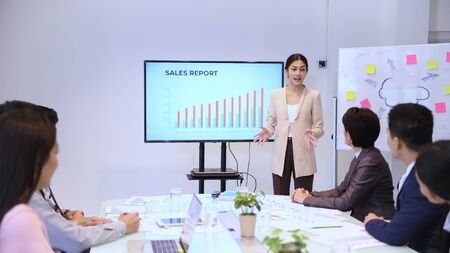 Business concepts. The manager is discussing with the employees at the meeting. 4k Resolution.の写真素材