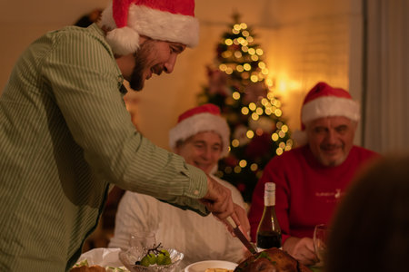 Russian family eating together on Christmas Day at home.の写真素材