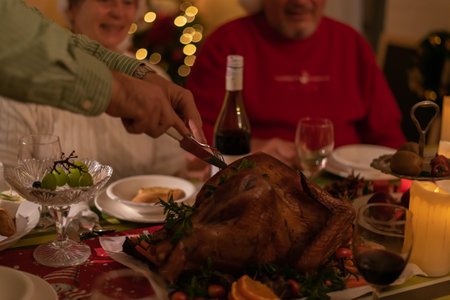 Russian family eating together on Christmas Day at home.の写真素材