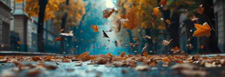 Autumn maple leaves falling on the city street.の素材