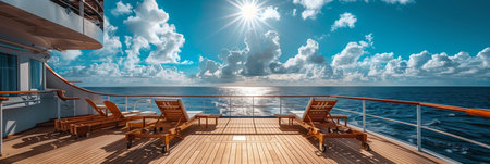 Luxury cruise ship deck with lounge chairs and wide view of the blue sky on a sunny day.の素材