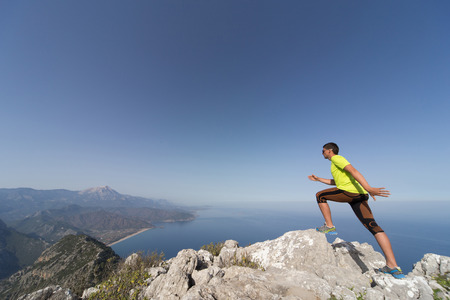 Running man in the summer in a beautiful location.の写真素材