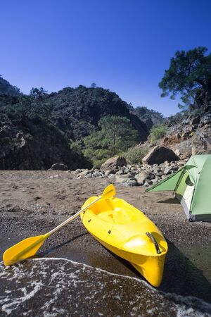 Kayak on the beach on a sunny day.の写真素材